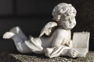 Statue-of-an-Angel-on-a-Grave-300x200