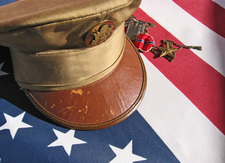 Army hat and US flag